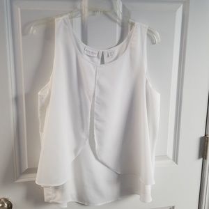 Sleeveless white polyester blouse